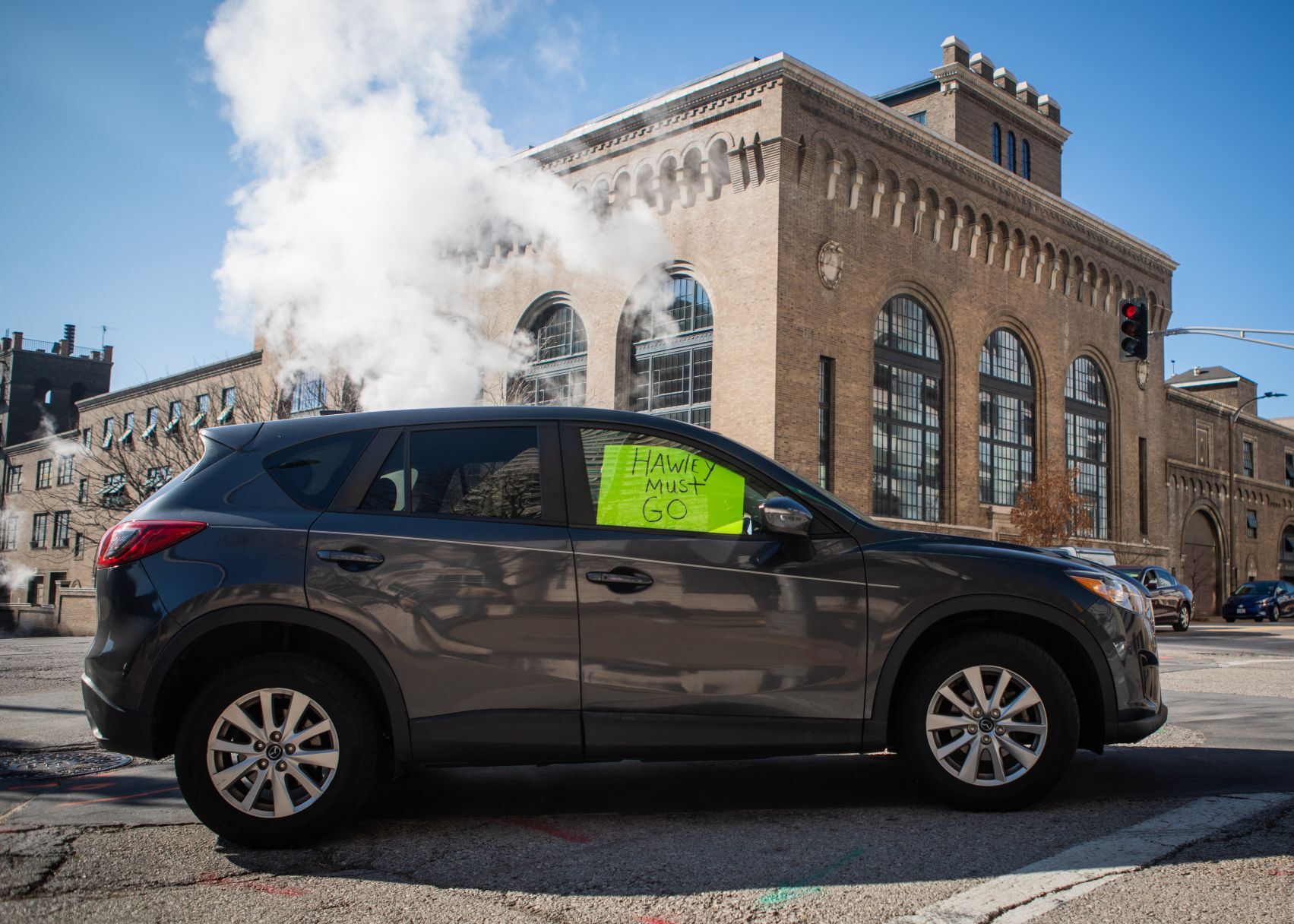 Demonstrators demand Hawley's resignation at downtown protest